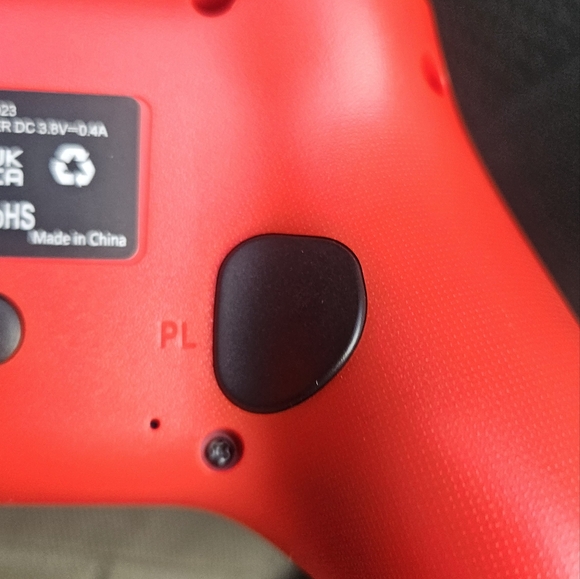 Vibrant Red and Blue Gaming Controllers - Picture 9 of 16